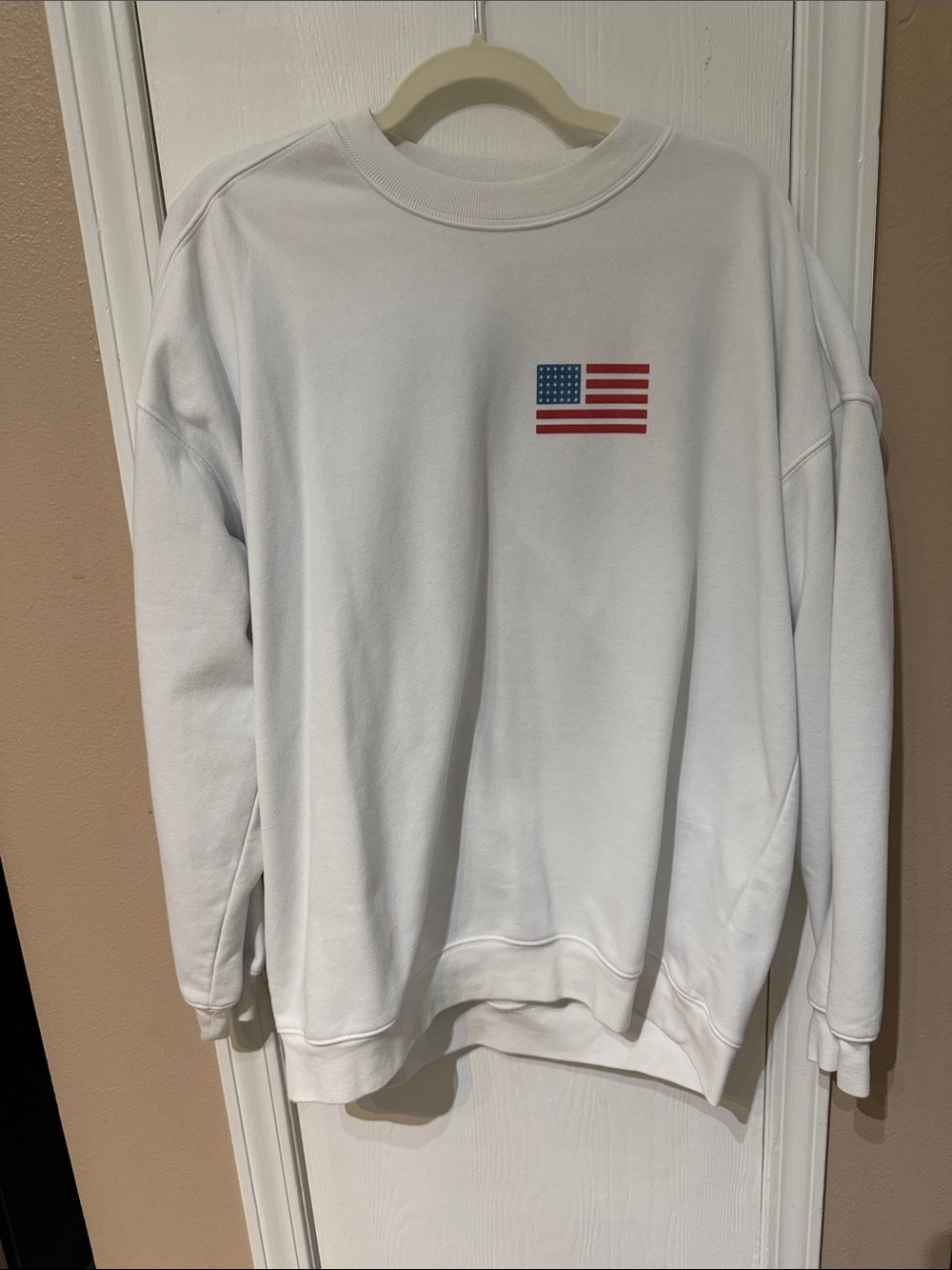 Pink Lily White Oversized Crewneck Sweatshirt with Small Red & Blue Flag Print